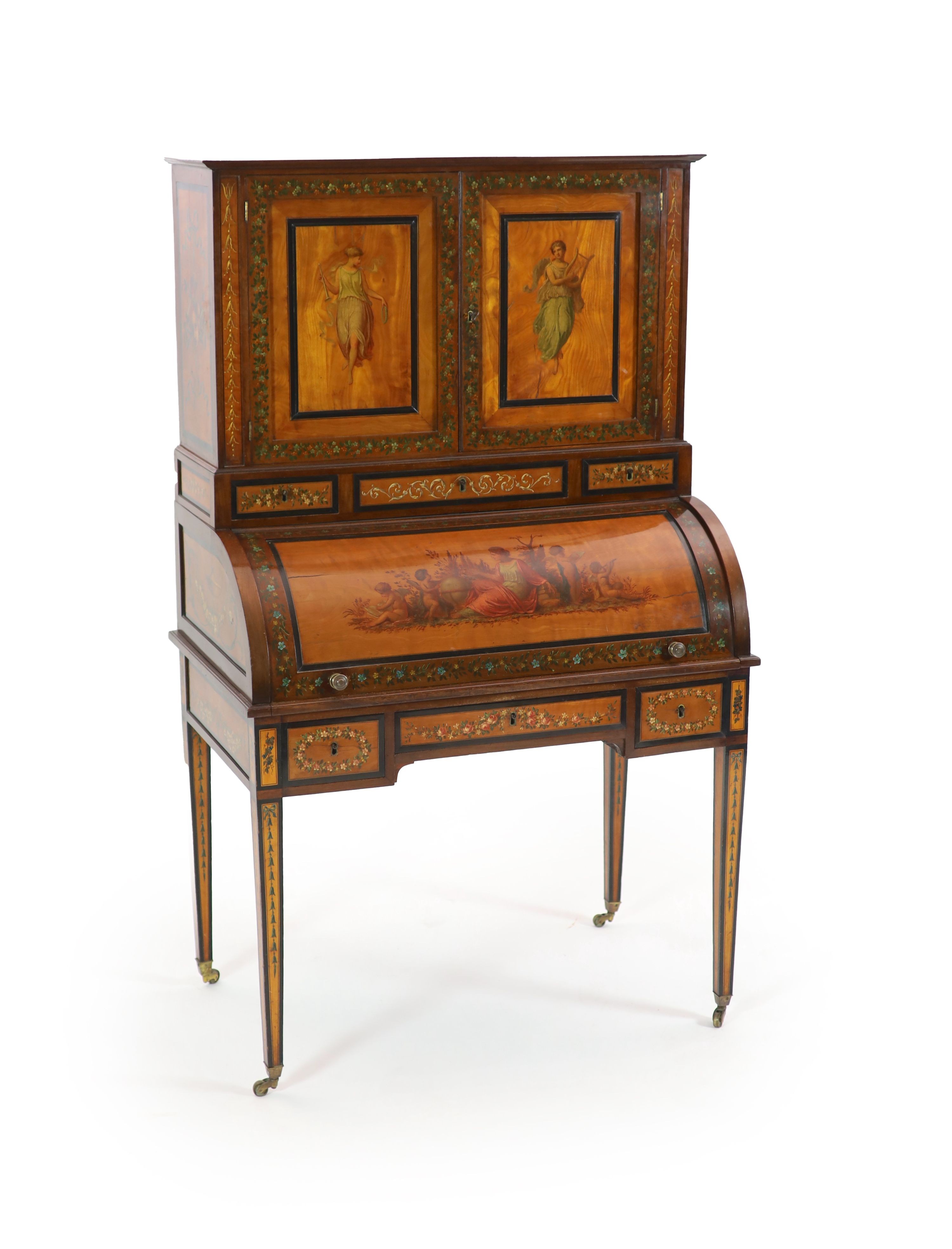 An Edwardian Sheraton Revival painted satinwood cylinder bureau / bonheur du jour H 162cm. W 97cm. D 58cm.